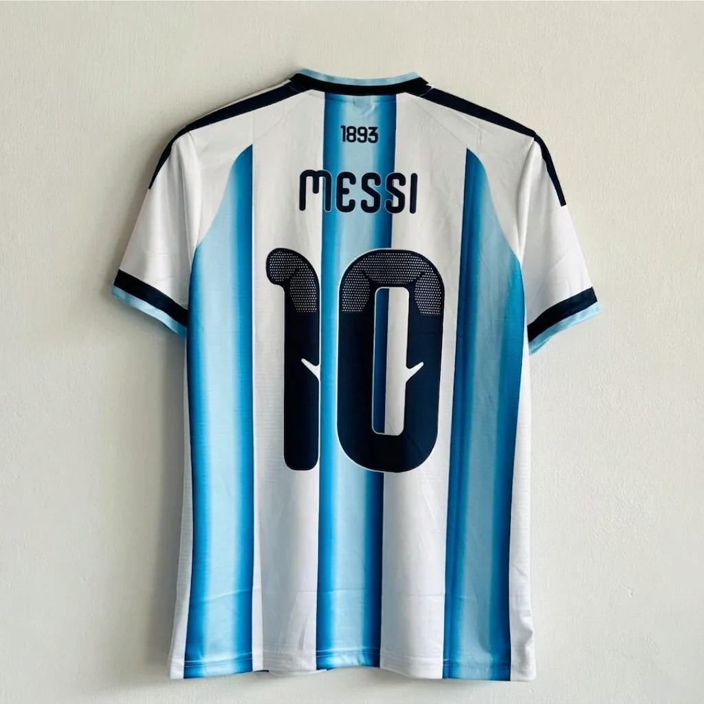 Soccer jersey with '10' and 'Messi' on a light gray background