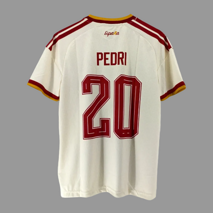 White sports jersey with red accents and 'Pedri' and number '20' on a gray background