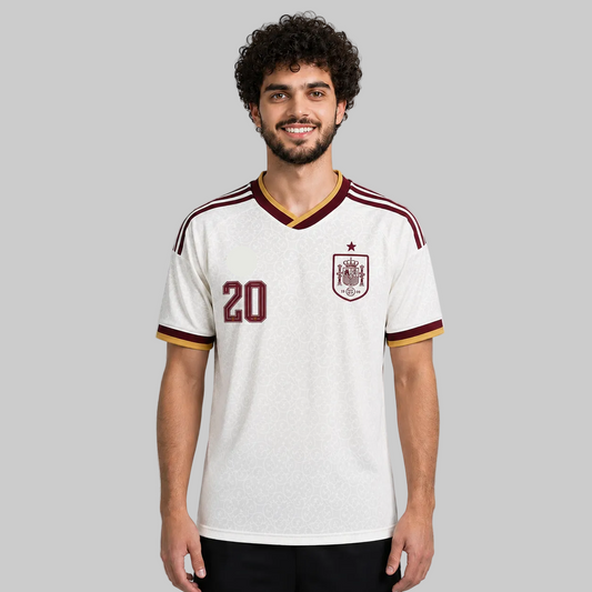 Person wearing a white sports jersey with maroon accents and Adidas logo on a gray background